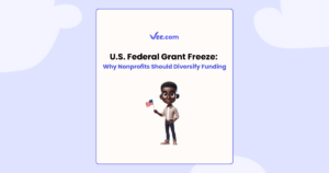 Illustration of a person holding an American flag on a light blue background with text: "U.S. Federal Grant Freeze: Why Nonprofits Should Diversify Funding.